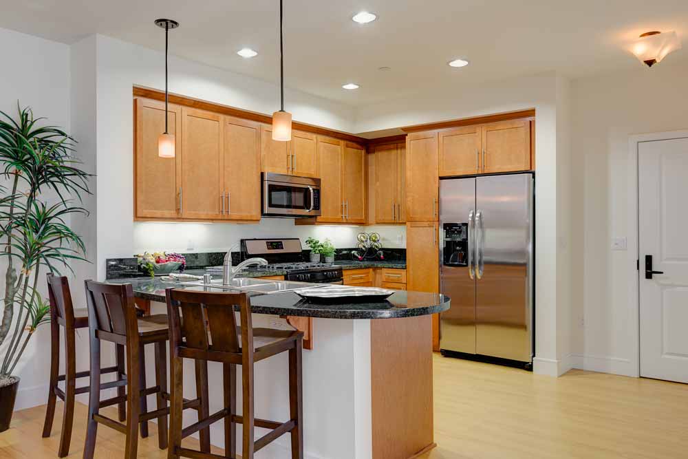 Picture of kitchen of furnished unit.