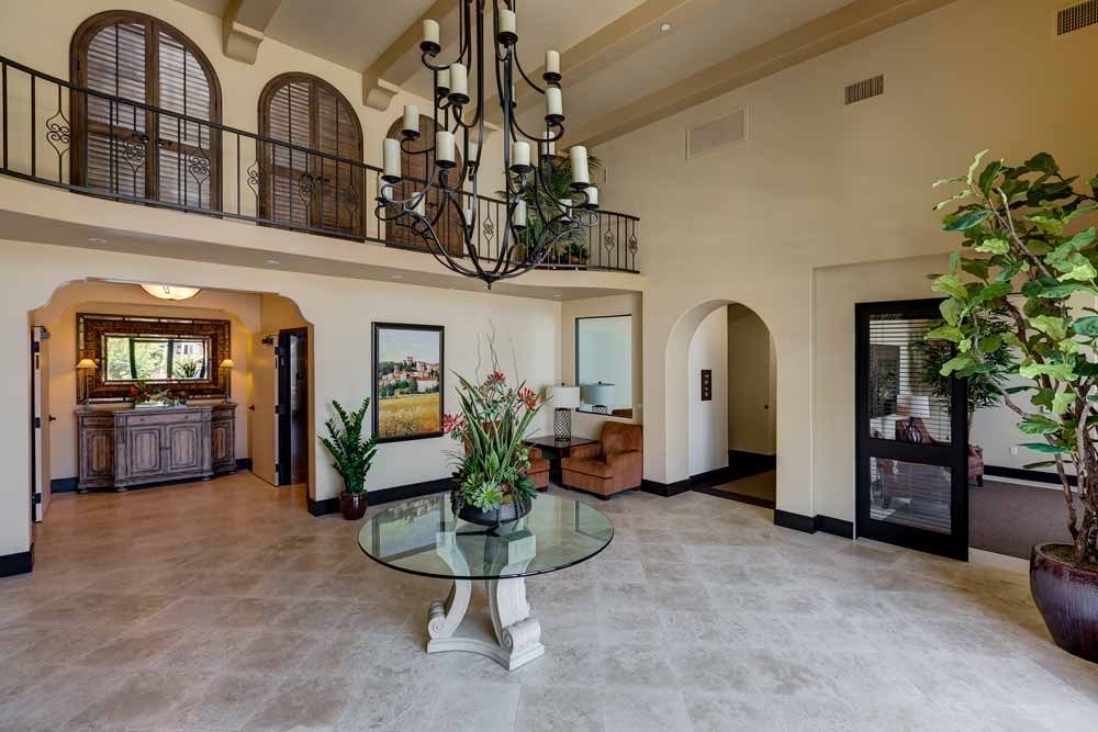 Picture of entryway and living area of furnished unit.